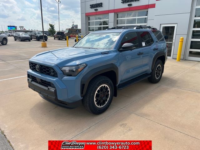 2026 Toyota 4Runner i-FORCE MAX TRD Off-Road Premium i-FORCE MAX in Heritage Blue — front three-quarter view