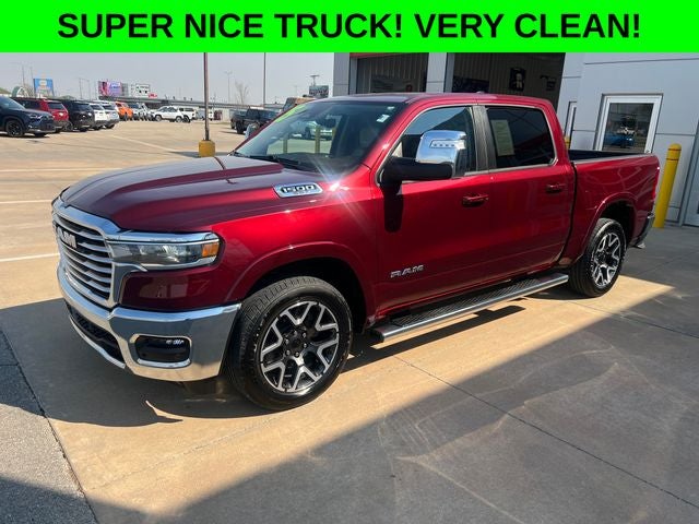 2025 RAM 1500 Laramie in Delmonico Red Pearlcoat — front three-quarter view
