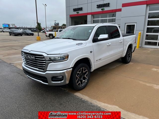 2026 RAM 1500 Laramie in Ivory White Tri-Coat Pearl-Coat Exterior Paint — front three-quarter view