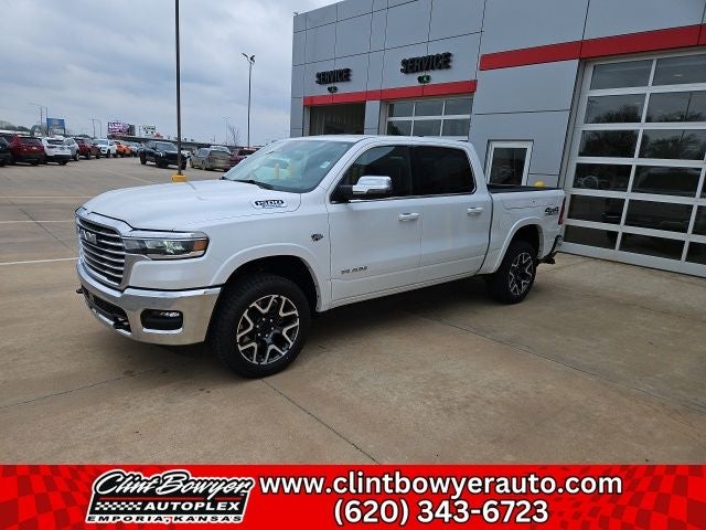 2026 RAM 1500 Laramie in Ivory White Tri-Coat Pearl-Coat Exterior Paint — front three-quarter view