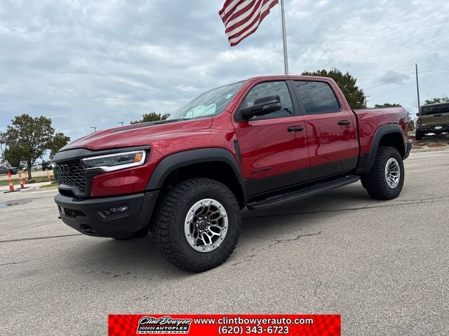 2026 RAM 1500 RHO in Molten Red Pearl-Coat Exterior Paint — front three-quarter view