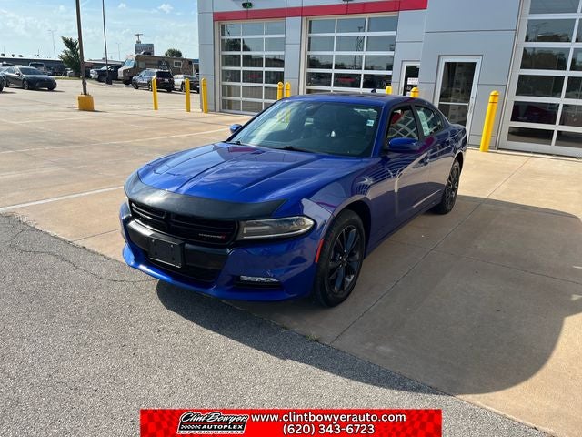 2021 Dodge Charger SXT in Indigo Blue — front three-quarter view